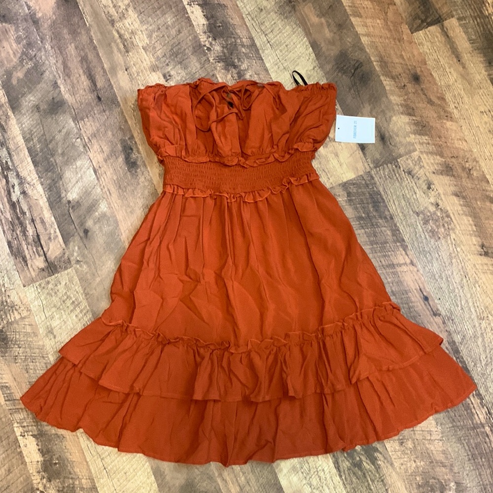 NWT. Forever21 Rust Orange Strapless Smocked Woven Ruffle Dress. Size Me…
